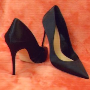 Pointed black heel.